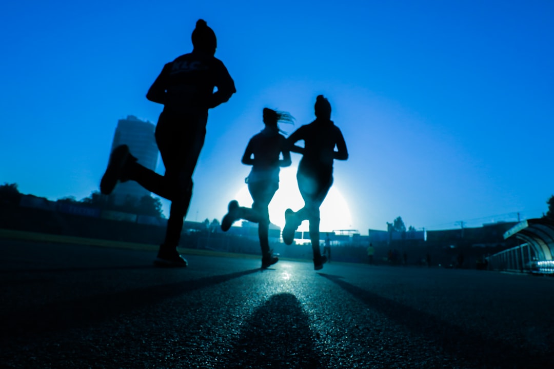 Runners racing in marathon event