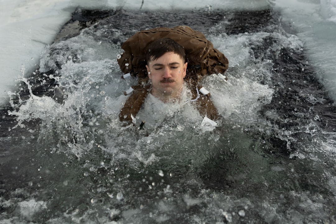Athlete using cold plunge for recovery