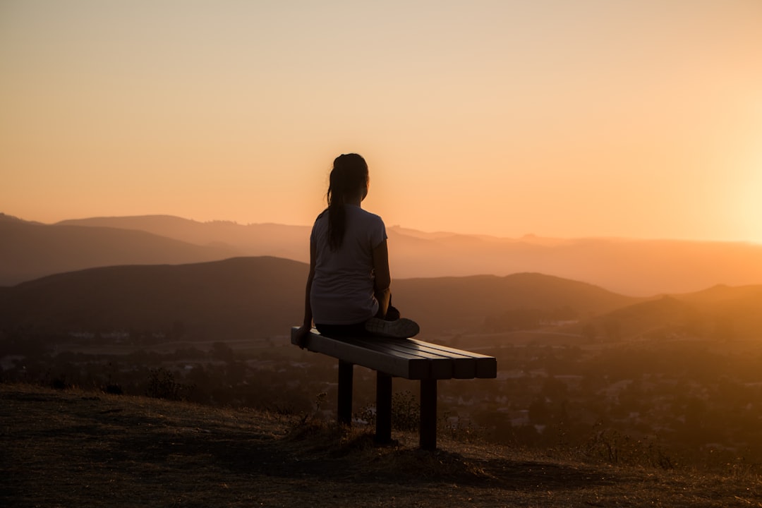 Person meditating and practicing yoga