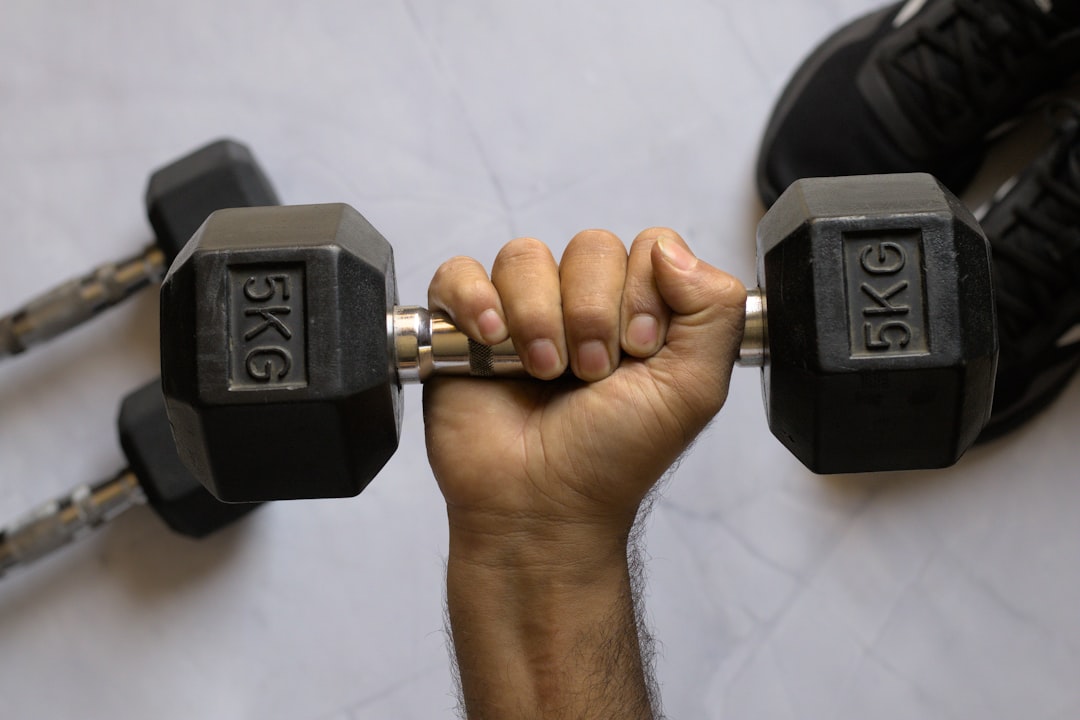 Farmer carry dumbbell grip strength exercise