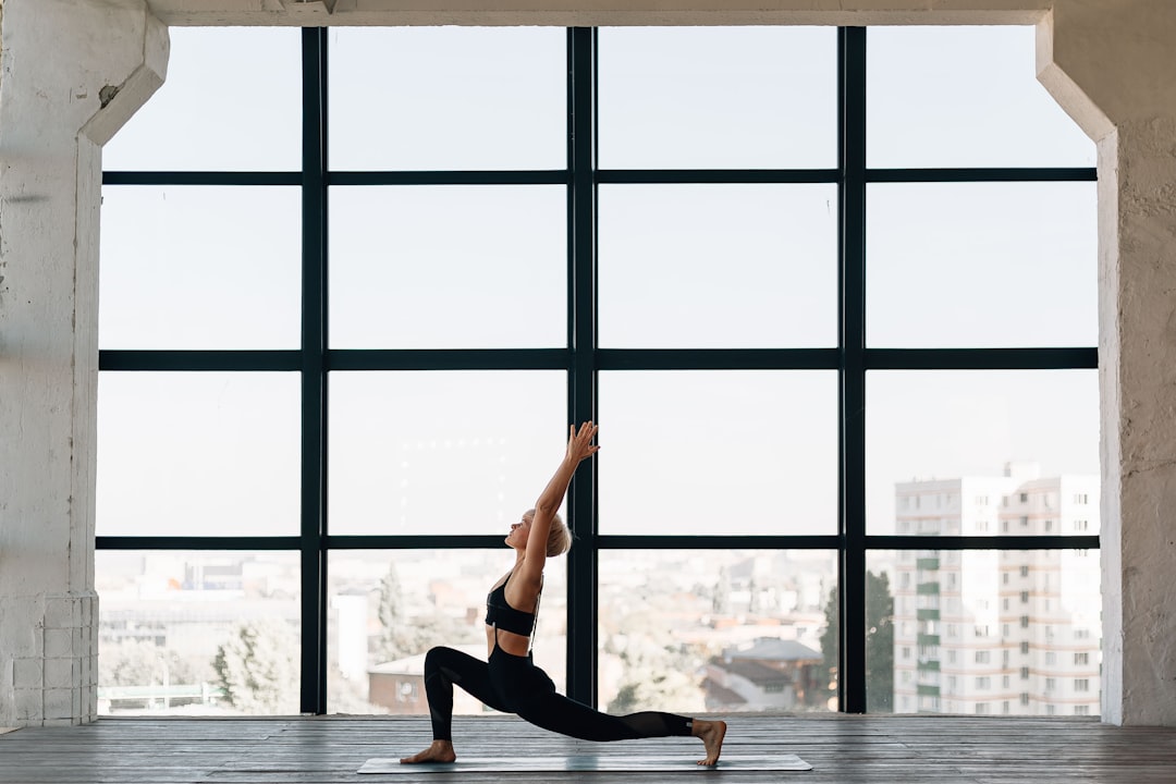 Woman performing mobility and flexibility exercises