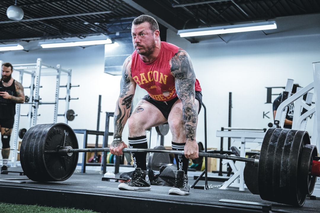 Progressive overload strength training gym barbell