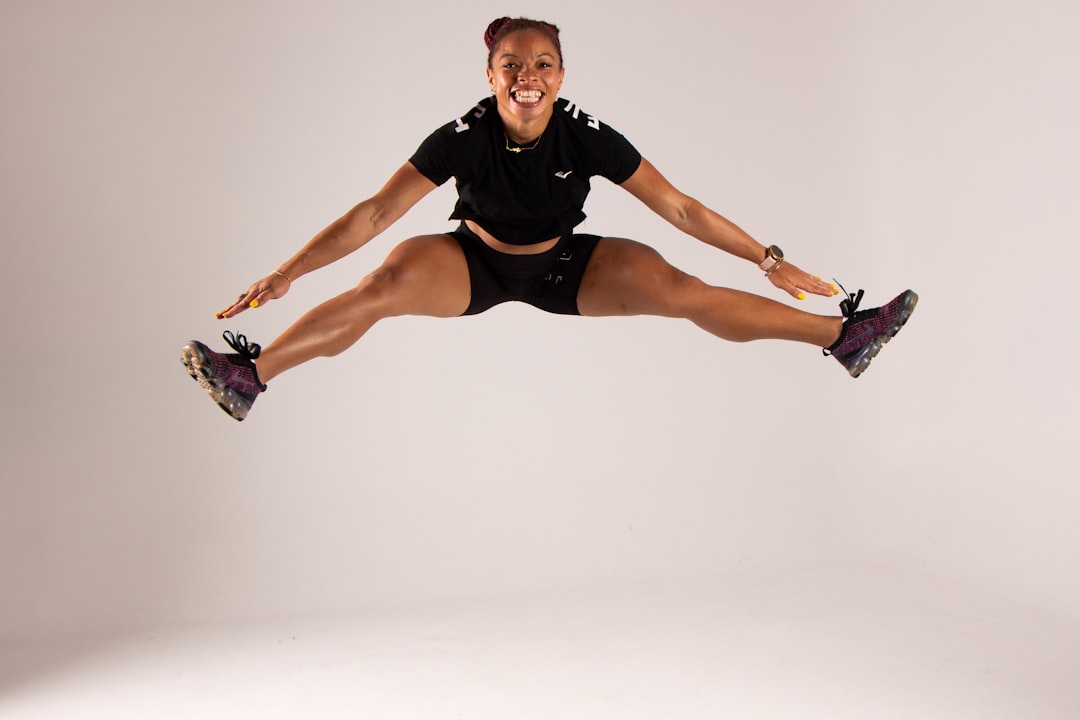 Athlete performing broad jump for explosive power and horizontal force production