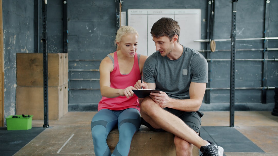 Tracking progressive overload workout progress with fitness log