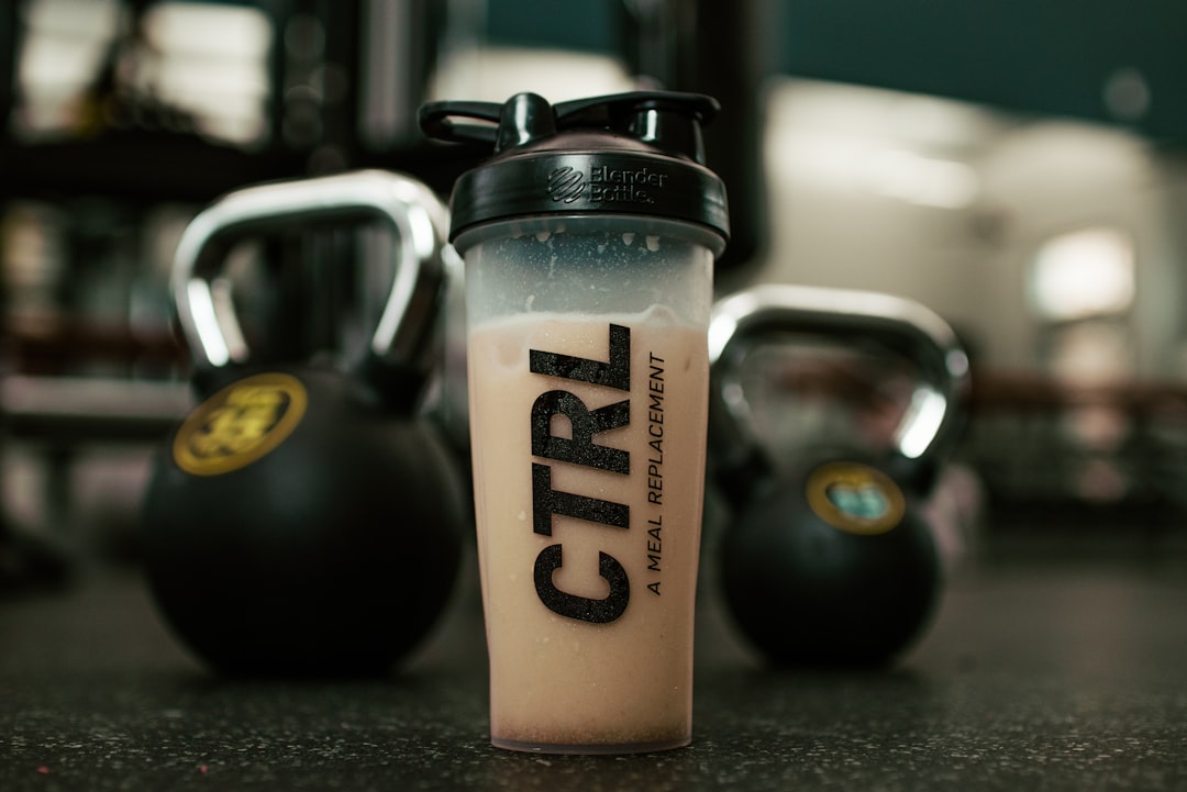 Athlete with post workout protein shake