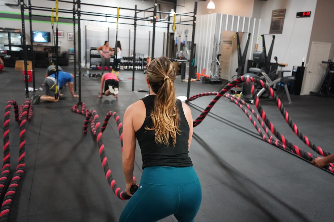 Woman using resistance band for strength training workout
