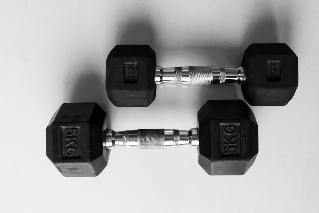 Athlete performing rest pause training with barbell