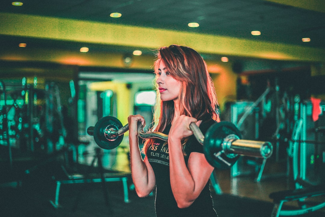 Woman doing weight lifting training