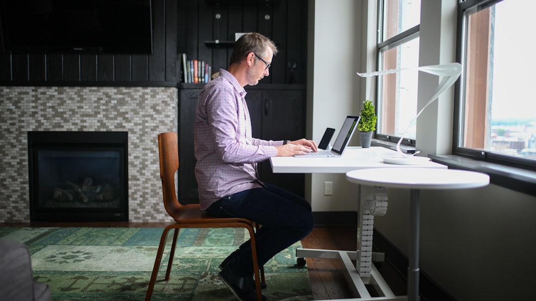 Person working at desk with walking pad
