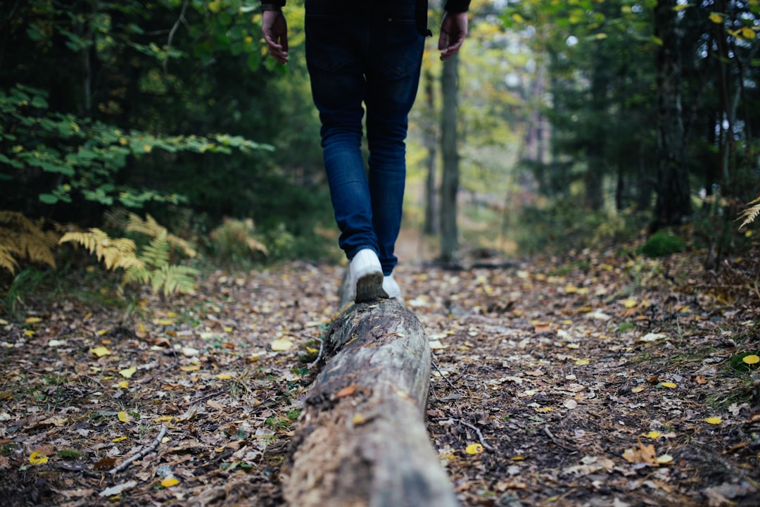 Man walking in forest practicing mindfulness